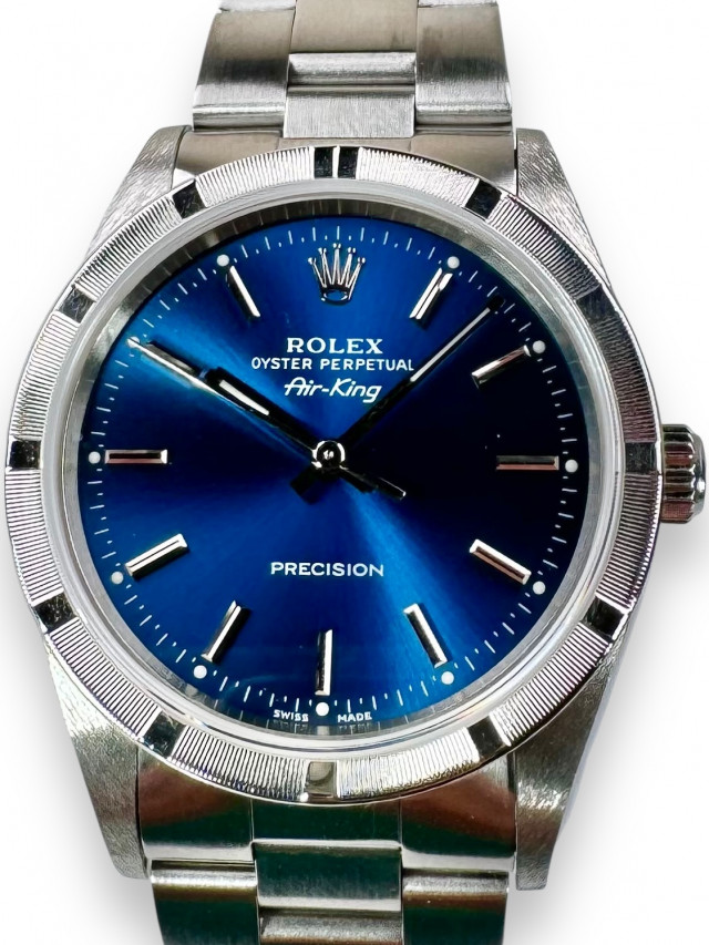 Rolex 14010 Steel on Oyster, Engine Turned Bezel Blue with Luminous Index & Silver Arabic 3-6-9