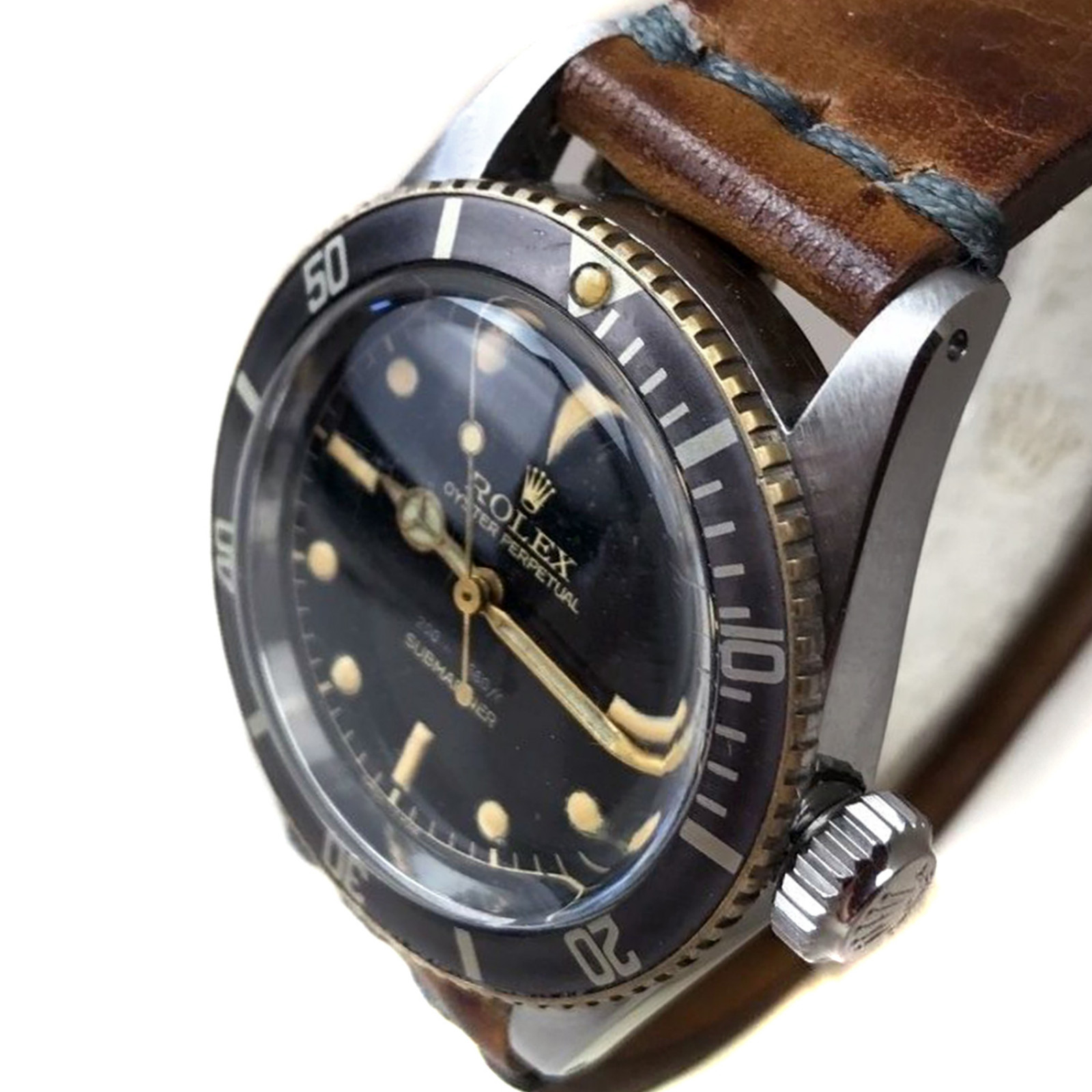 Vintage Rolex 6538 38 mm Steel on Strap, Black Bezel
