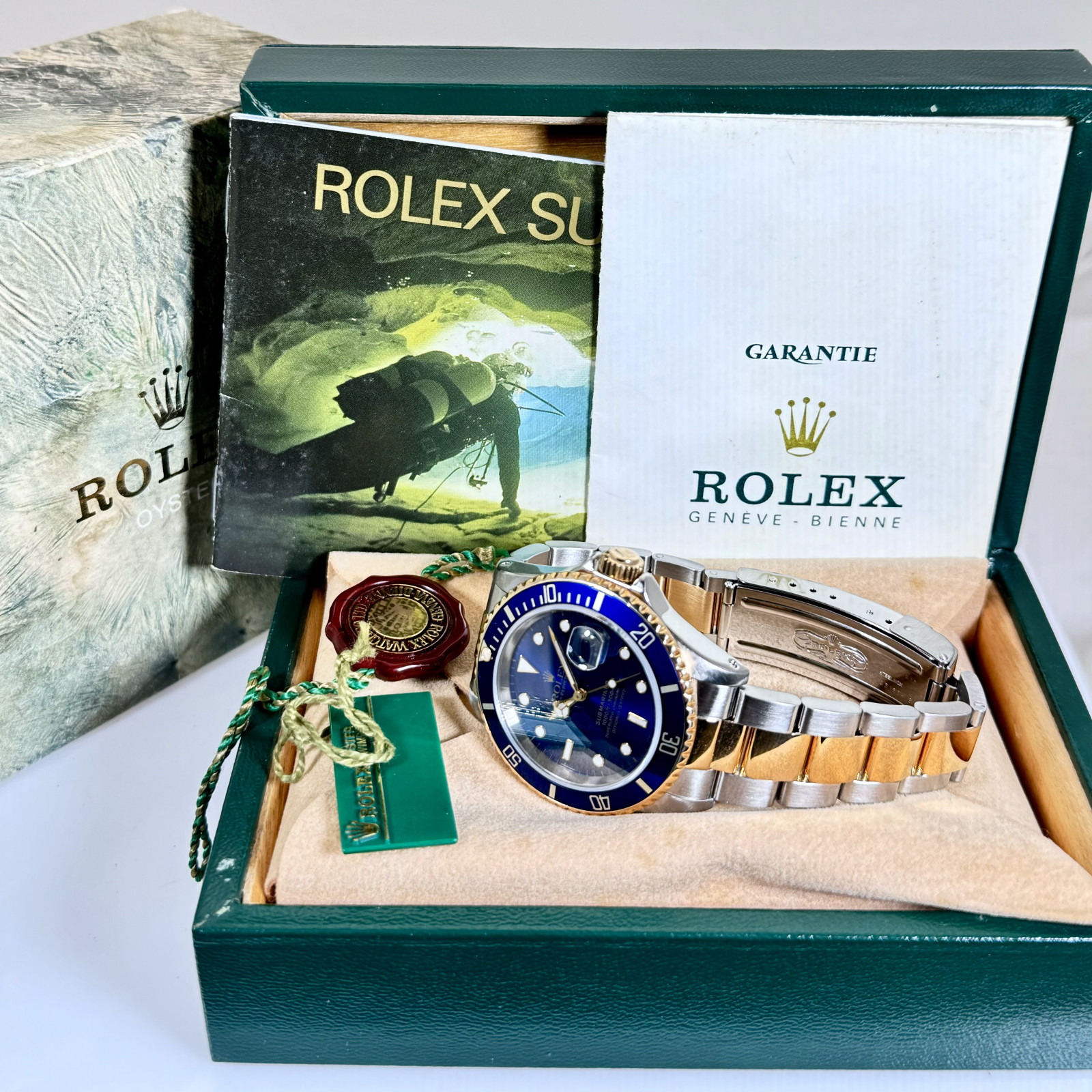Rolex Submariner 16613 40 mm with Blue Dial Ermitage Jewelers