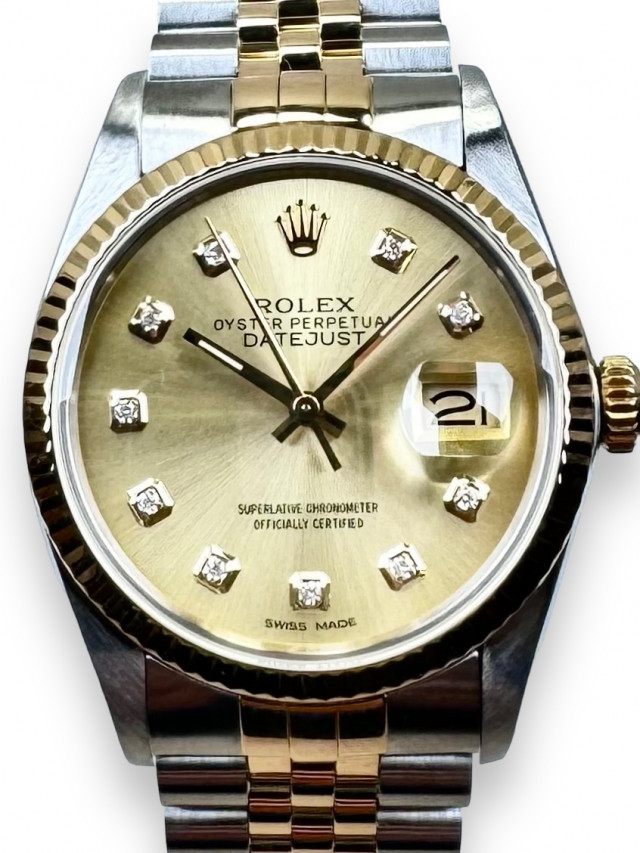 Rolex 16013 Yellow Gold & Steel on Jubilee, Fluted Bezel Steel Tapestry with Gold Index